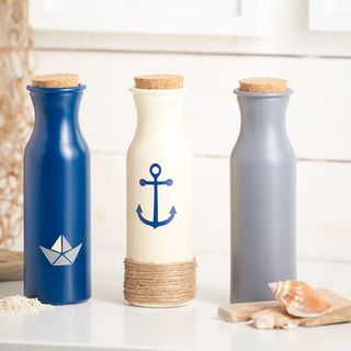 Maritime glass bottles with plotted motifs